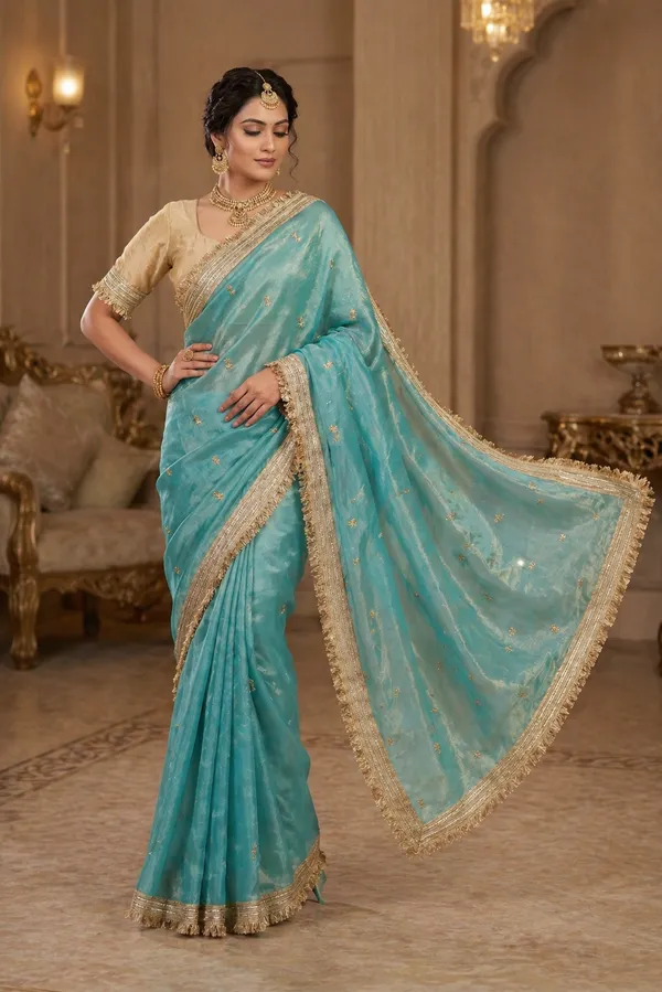 Fandy_sattin_Fabric_With_Beautiful_Sequence__butti__all_over__Saree_With_Rich_elegant_lace_on_either_side