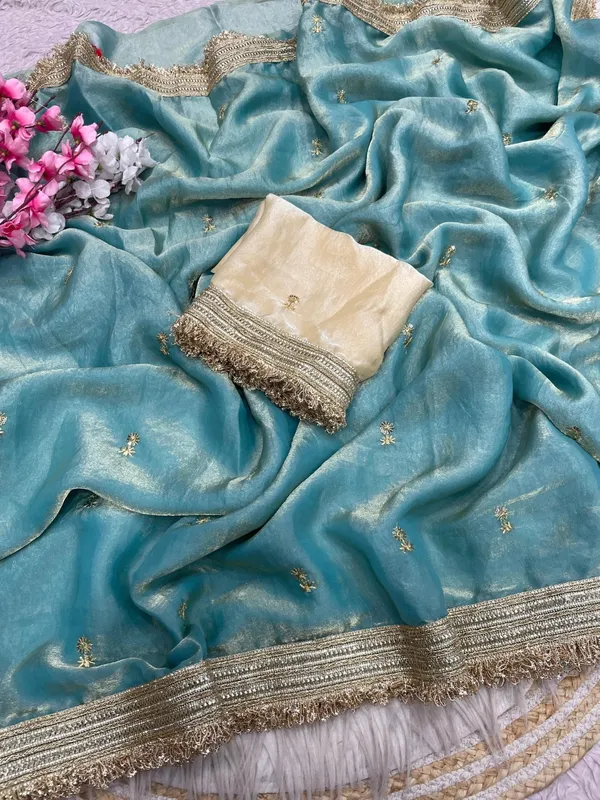 Fandy_sattin_Fabric_With_Beautiful_Sequence__butti__all_over__Saree_With_Rich_elegant_lace_on_either_side