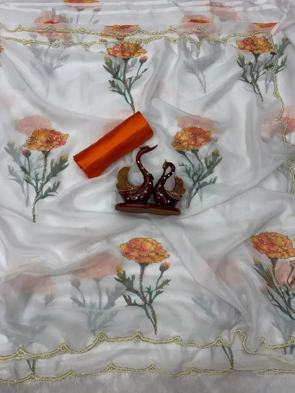 Havy_Soft_Taby_Silk_Fabric_With_Beutiful_Floral_Prints_With_Beads_And_Katdana_Handwork_In_Border
