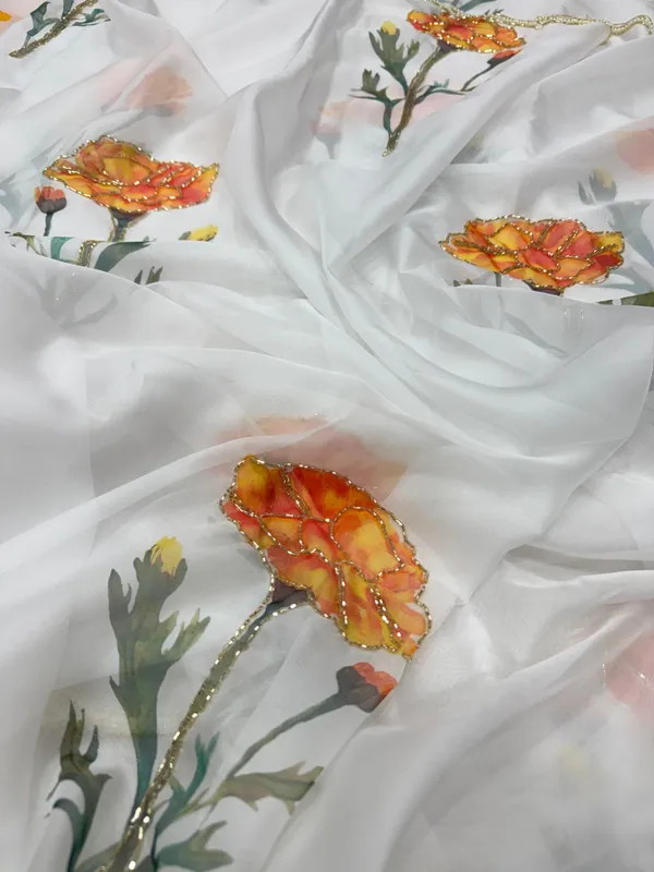 Havy_Soft_Taby_Silk_Fabric_With_Beutiful_Floral_Prints_With_Beads_And_Katdana_Handwork_In_Border