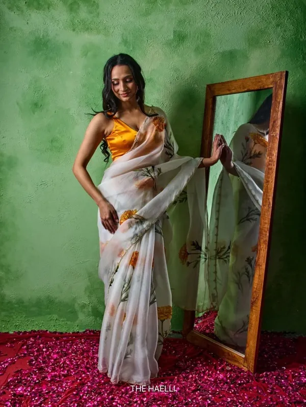 Havy_Soft_Taby_Silk_Fabric_With_Beutiful_Floral_Prints_With_Beads_And_Katdana_Handwork_In_Border
