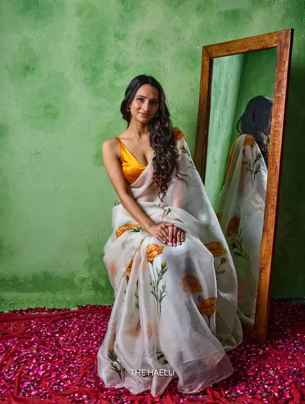 Havy_Soft_Taby_Silk_Fabric_With_Beutiful_Floral_Prints_With_Beads_And_Katdana_Handwork_In_Border