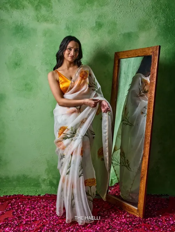 Havy_Soft_Taby_Silk_Fabric_With_Beutiful_Floral_Prints_With_Beads_And_Katdana_Handwork_In_Border