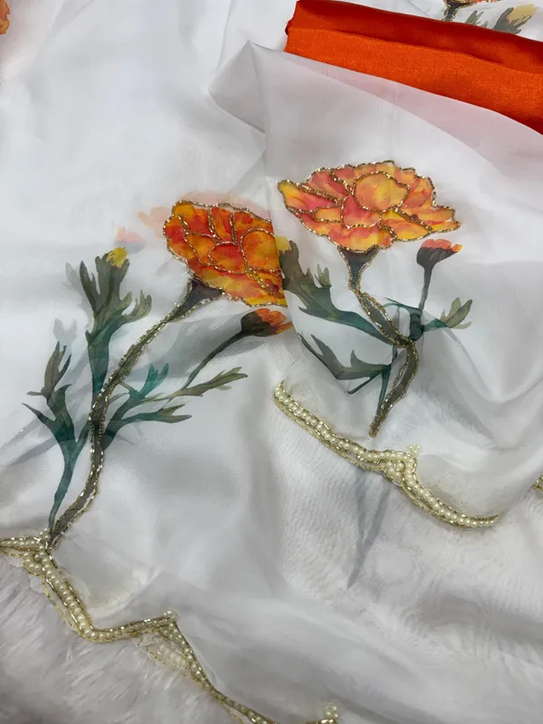 Havy_Soft_Taby_Silk_Fabric_With_Beutiful_Floral_Prints_With_Beads_And_Katdana_Handwork_In_Border