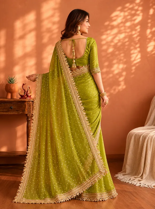 N*C_Moss__Fabric_With_Beautiful__Jari_butti__all_over__Saree_With_Rich_elegant_lace_on_either_side