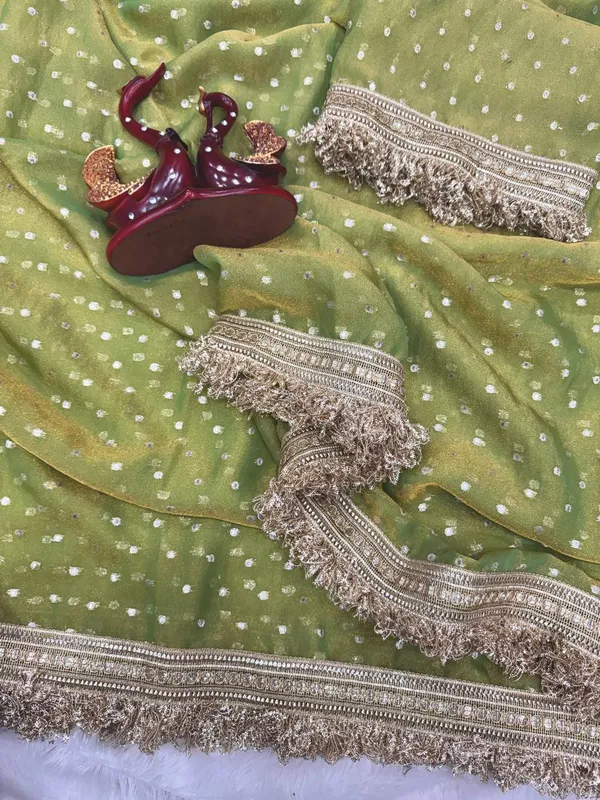 N*C_Moss__Fabric_With_Beautiful__Jari_butti__all_over__Saree_With_Rich_elegant_lace_on_either_side