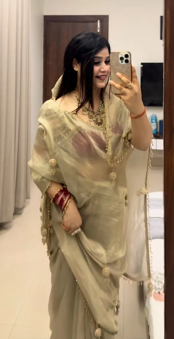 Beige_Stay_Beautiful_With_Our_New_Fandy_Sattin_Saree_With_Beautiful_Crystal_Moti_Lace_With_Beautiful_Handwork__Latkan_In_Pallu