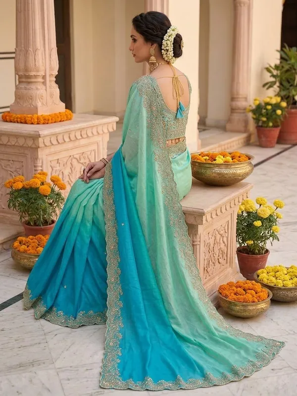 Very_soft_&_elegant_rich_look_fendy_sartin_fabric_with_beautiful_embroidery_3_mm_sequence_work_heavy_border_with_buttis_in_all_over_saree_aarco