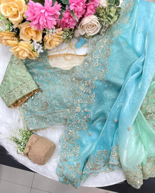 Very_soft_&_elegant_rich_look_fendy_sartin_fabric_with_beautiful_embroidery_3_mm_sequence_work_heavy_border_with_buttis_in_all_over_saree_aarco