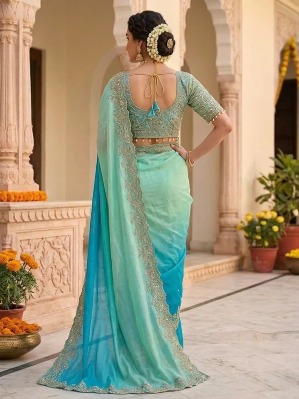 Very_soft_&_elegant_rich_look_fendy_sartin_fabric_with_beautiful_embroidery_3_mm_sequence_work_heavy_border_with_buttis_in_all_over_saree_aarco