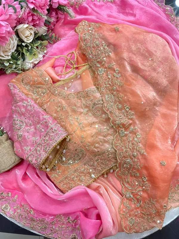 Very_soft_&_elegant_rich_look_fendy_sartin_fabric_with_beautiful_embroidery_3_mm_sequence_work_heavy_border_with_buttis_in_all_over_saree_aarco