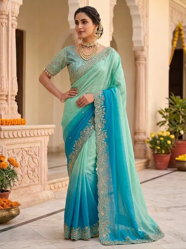 Very_soft_&_elegant_rich_look_fendy_sartin_fabric_with_beautiful_embroidery_3_mm_sequence_work_heavy_border_with_buttis_in_all_over_saree_aarco