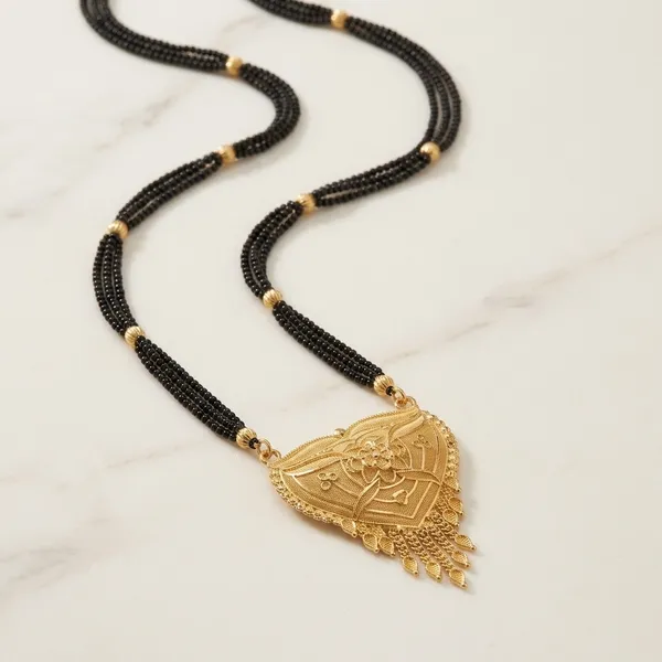 Triple_Black_Bead_Chain_With_Gold-Tone_Heart_Pendant_Mangalsutra_For_Women