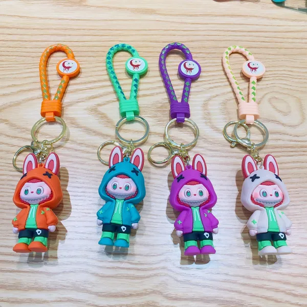 LABUBU_THE_MONSTERS_HOODIE_KEYCHAIN_|_Bunny_Ear_Labubu_Collectible_Keyring_with_Braided_Strap_|_Orange,_Blue,_Purple_&_White