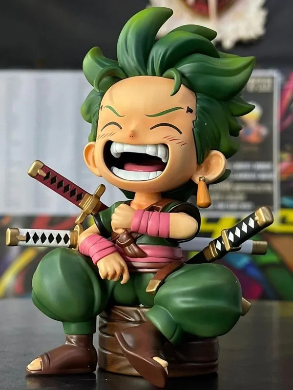 Roronoa_Zoro_Kid_Sitting_Pose_Action_Figure_–_12.5_CM_|_One_Piece_Anime_Collectible