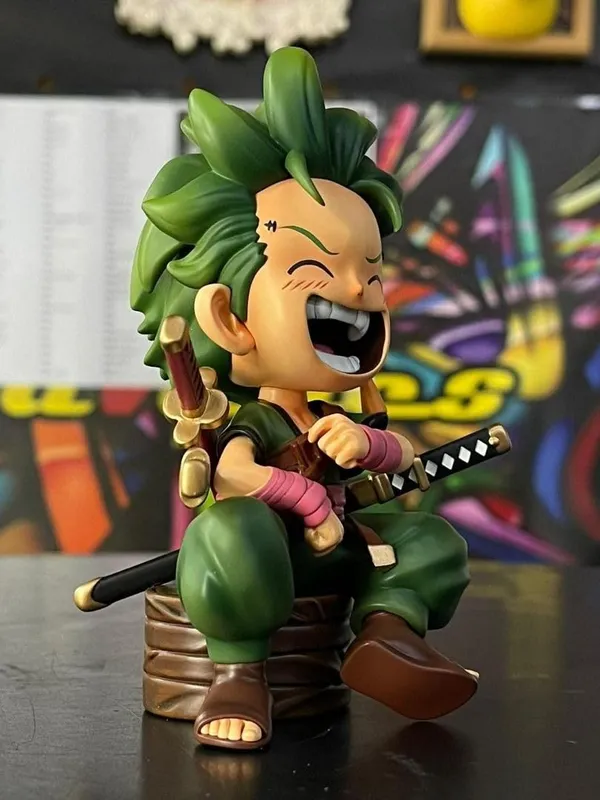 Roronoa_Zoro_Kid_Sitting_Pose_Action_Figure_–_12.5_CM_|_One_Piece_Anime_Collectible