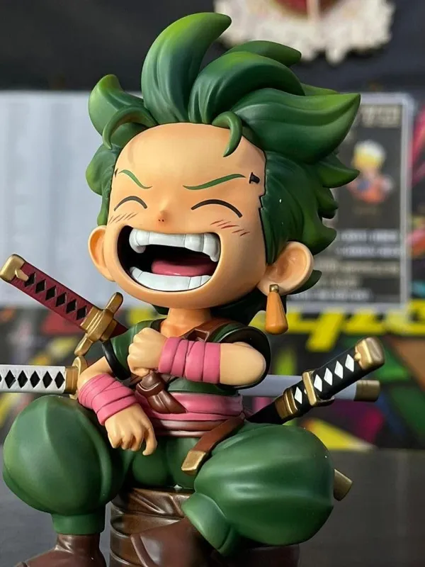 Roronoa_Zoro_Kid_Sitting_Pose_Action_Figure_–_12.5_CM_|_One_Piece_Anime_Collectible