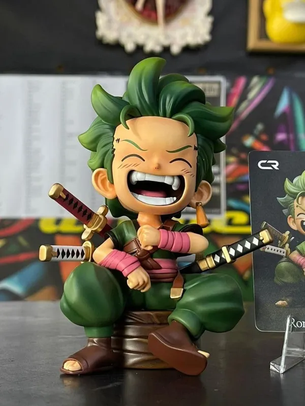Roronoa_Zoro_Kid_Sitting_Pose_Action_Figure_–_12.5_CM_|_One_Piece_Anime_Collectible