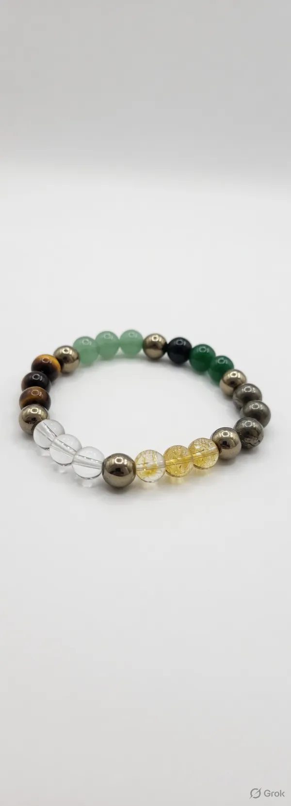 Sidh_Dhanyog_Band_(_Pyrite_,_Tiger_Eye_,_Citrene_,_Aventurine_&_Sphtic_Beads_)