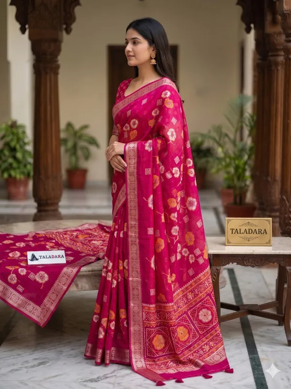 Taladara_Rich_Butta_Cotton_Saree_with_Mirror_Work_&_Latkans