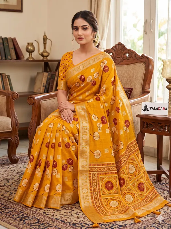 Taladara_Rich_Butta_Cotton_Saree_with_Mirror_Work_&_Latkans