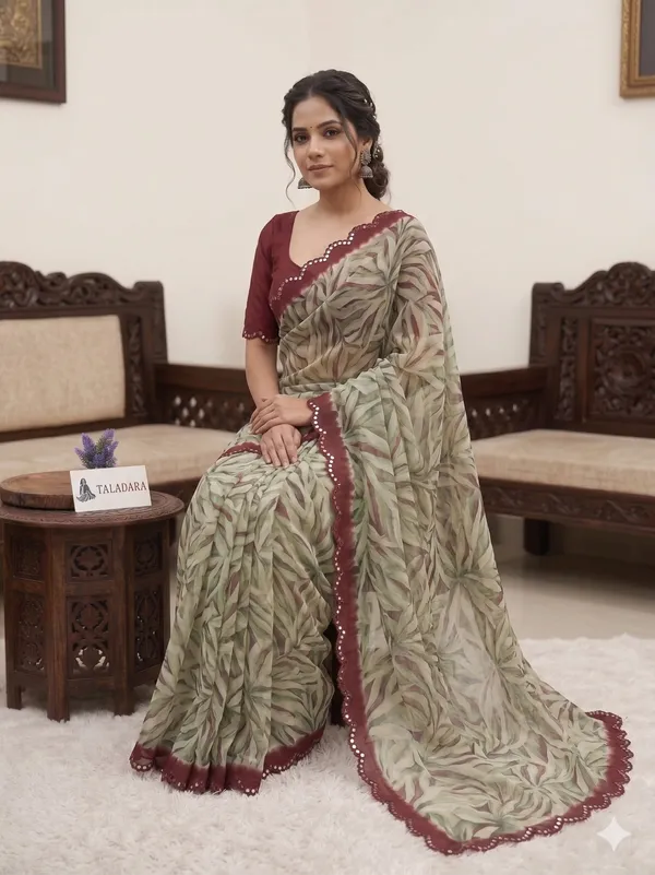 Taladara's_New_Georgette_Printed_Saree_With_Unstitched_Blouse_With_Mirror_Lace_Border