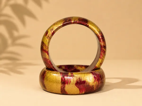 Gold_And_Burgundy_Resin_Bangles_For_Women__(pack_of_two_pieces)