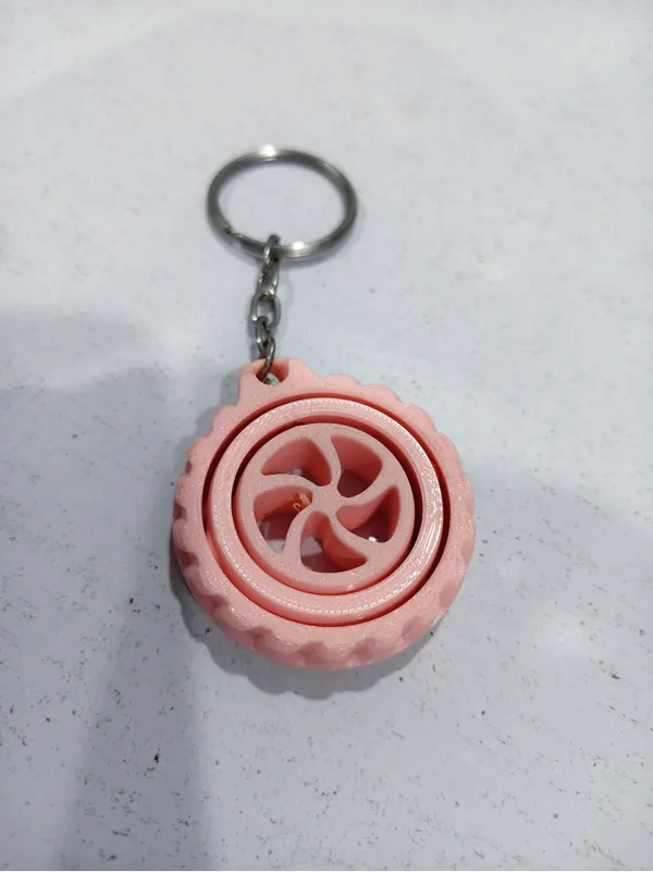 Light_Pink_Wheel_Design_Keychain_With_Hidden_Compartment