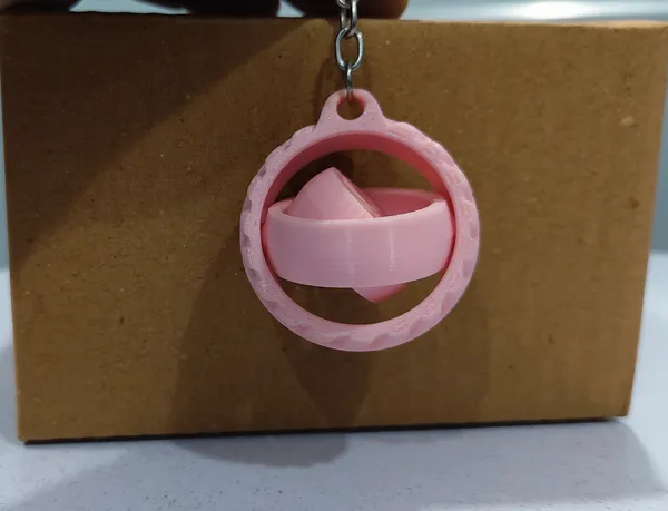 Light_Pink_Wheel_Design_Keychain_With_Hidden_Compartment