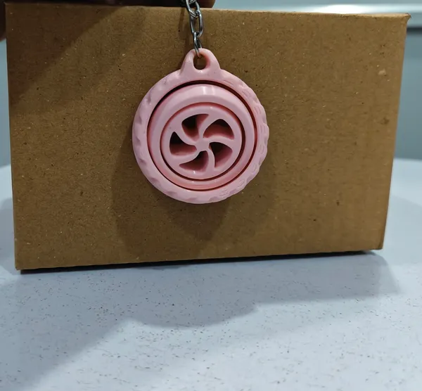 Light_Pink_Wheel_Design_Keychain_With_Hidden_Compartment