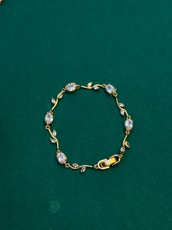 Elegant_Gold-Plated_Crystal_Bracelet_With_Leaf_Design