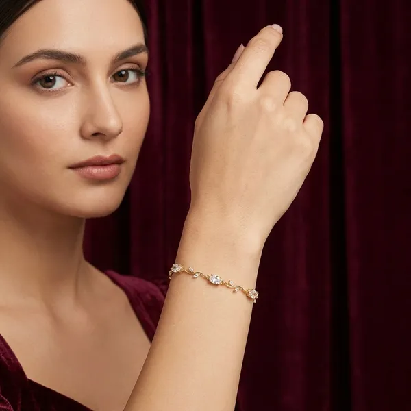Elegant_Gold-Plated_Crystal_Bracelet_With_Leaf_Design