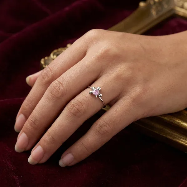 Pink_Solitaire_Ring_With_Floral_Prong_Setting