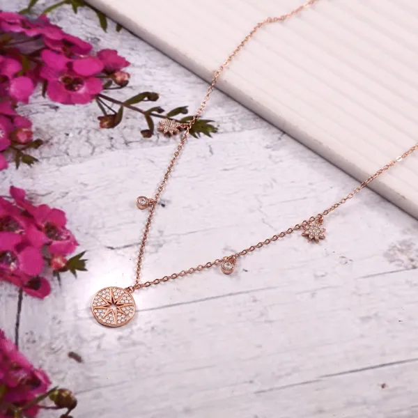 Elegant_Compass_Charm_Necklace_With_Star_Accents_For_Women