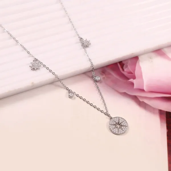 Elegant_Compass_Charm_Necklace_With_Star_Accents_For_Women