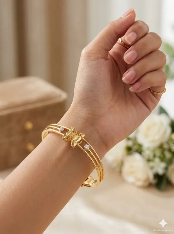 Golden_Butterfly_Charm_Bracelet_For_Women_-_Elegant_Gold-Toned_Bangle_With_Crystal_Accents