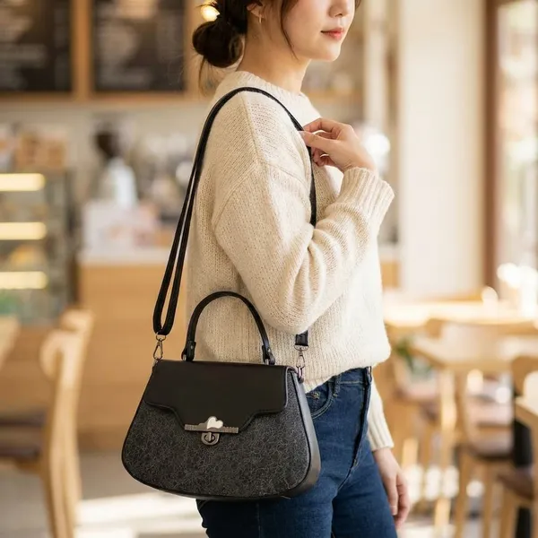 Women's_Black_Glitter_Handbag_With_Top_Handle_And_Crossbody_Strap