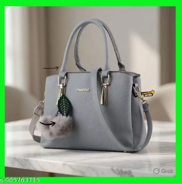 Grey_Faux_Leather_Handbag_With_Pom_Pom_Charm