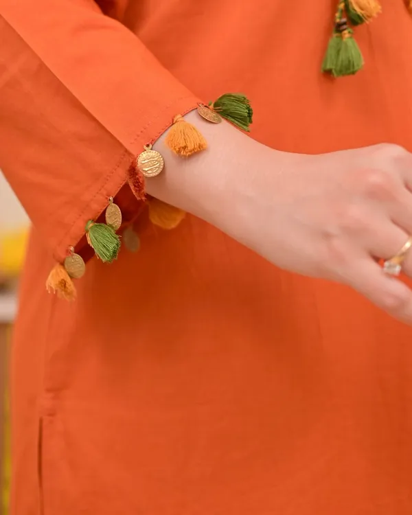 Women’s_Orange_Straight_Kurta_with_Embroidered_Neckline_&_Matching_Pants_Set