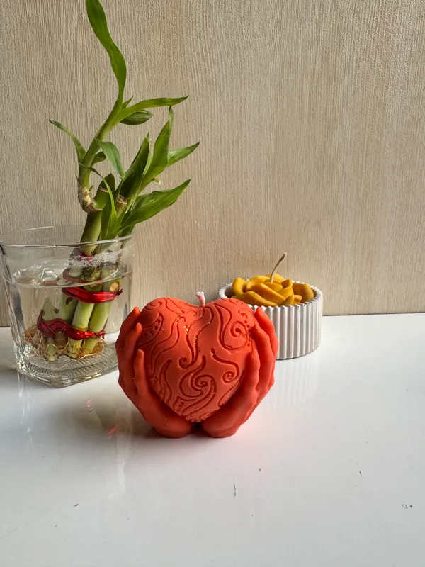 Brick_Red_Heart_In_Hand_Candle