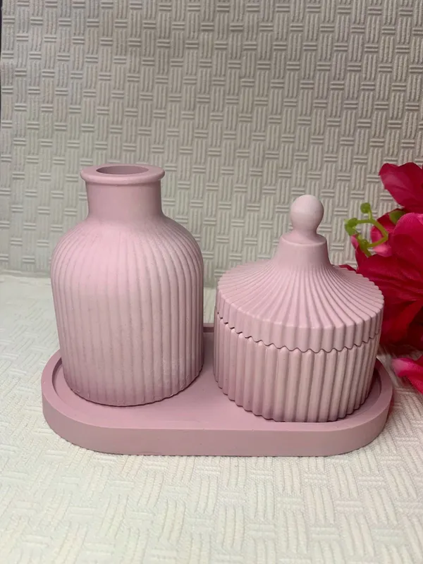 Pink_Concrete_Ribbed_Jars,_Trays,Tray_And_Ribbed_Vase