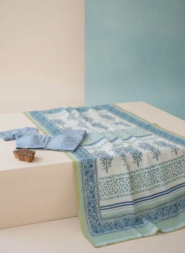 Blue_And_White_Soft_Linen_Floral_Printed_Saree_with_a_blouse_piece_For_Women
