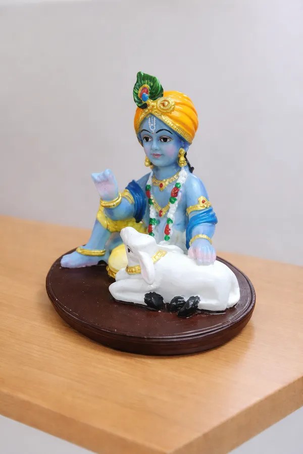 Baby_Krishna_With_Cow_Resin_Idol_For_Home_Decor