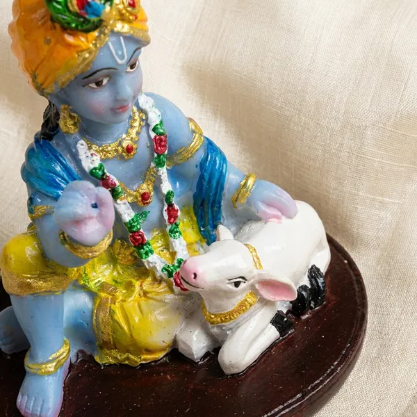 Baby_Krishna_With_Cow_Resin_Idol_For_Home_Decor