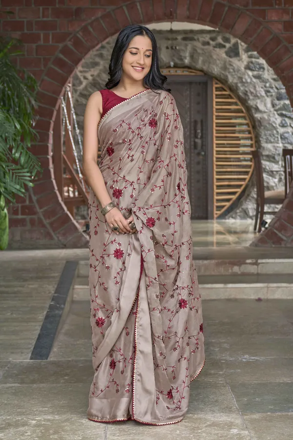 MANOHARI_Beige_Poly_Georgette_Sequence_And_Embroidery_Saree_With_Blouse_Piece
