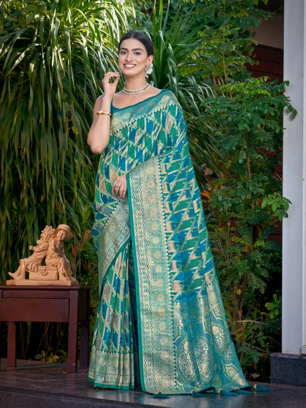 Manohari_Womens_Most_Trendy_Banarasi_Satin_Silk_Woven_Turquiose_Blue_Saree_With_Heavy_Jacquard_Work_Saree_With_Blouse_Piece
