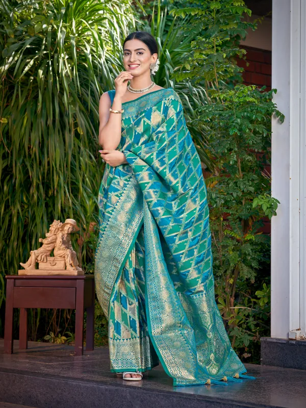 Manohari_Womens_Most_Trendy_Banarasi_Satin_Silk_Woven_Turquiose_Blue_Saree_With_Heavy_Jacquard_Work_Saree_With_Blouse_Piece