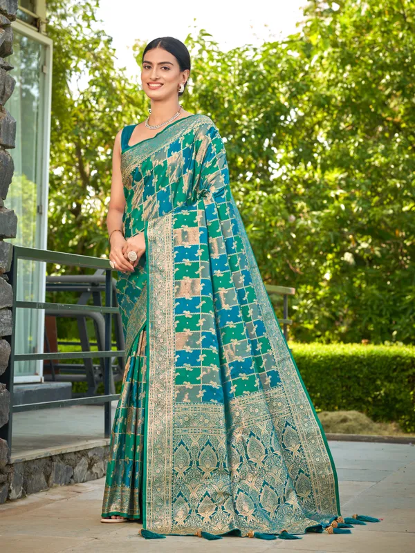 Manohari_Womens_Most_Trendy_Banarasi_Satin_Silk_Woven_Turquiose_Blue_Saree_With_Heavy_Jacquard_Work_Saree_With_Blouse_Piece