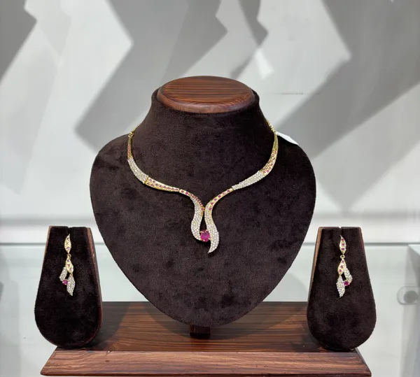 Elegant_American_Diamond_Snake_Necklace_Set_Gold_Toned_With_Earrings