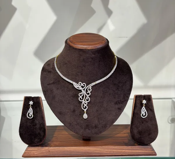 Elegant_Gold-Toned_American_Diamond_Necklace_Set_With_Matching_Earrings